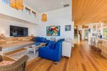 Living room with ocean views at Whaletopia